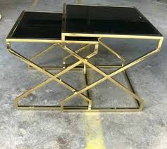 This coffee table takes an iconic waterfall silhouette, and gives it an airy upgrade with its slatted frame design. Living Room Furniture Black Glass Center Table Luxury Metal Hollow Rose Gold Frame Coffee Table China Glass Coffee Table Marble Top Coffee Table Made In China Com
