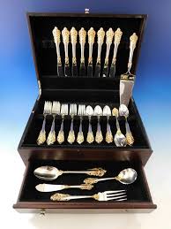 8 salad forks, 8 place forks, 8 place knives, 8 place spoons and 8 teaspoons. Grande Baroque Gold Accent By Wallace Sterling Silver Flatware For 8 Set 45 Pcs For Sale At 1stdibs
