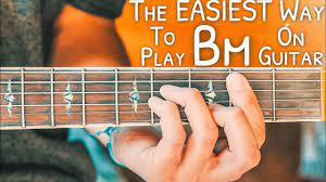 A chord is a harmonic combination of notes that rings out together at the same time. The Easiest Way To Play The Bm Chord On Guitar Bm Guitar Chord Easy Guitar Chords Learn Guitar Ukulele Lesson