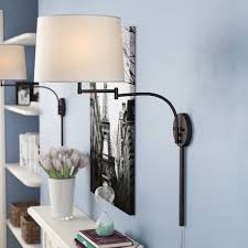 Bring Some Enhancing Illumination To Your Walls With This One Light Swing Arm Wall Sconce A Tradition Plug In Wall Sconce Sconces Bedroom Wall Sconces Bedroom