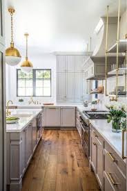Pros And Cons Of Flooring Laminate Vs Hardwood Interior Design Kitchen Farmhouse Kitchen Design Modern Farmhouse Kitchens