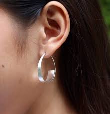 The more modern live/work loft erected above the garage delivers a symbolic dialogue of the old and new venice. Silver Hoops Modern Silver Spiral Hoops Silver Earrings Piercing Hoops Sterling Silver Hoops Gift Ideas Boholuxe Ear Hoops E102 Handmade Discovered