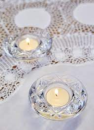 Add warmth and elegance to the table with this graceful votive. Waterford Crystal Set Of 2 Votives Blarney