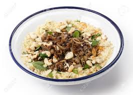 Place the couscous in a medium bowl; Spicy Moroccan Style Minced Beef Served With Couscous Mixed With Stock Photo Picture And Royalty Free Image Image 24383733