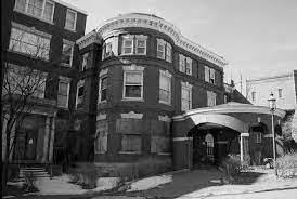 How many Oliver Grads were born in, or worked at St. John's Hospital?