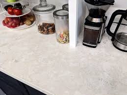 This dated granite countertop looks like marble now — just by using paint! Paint Kitchen Countertops A Complete Step By Step Guide