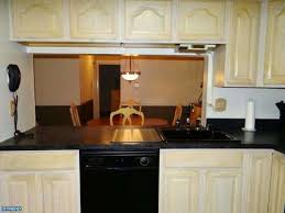 Painting kitchen cabinets can be a long, tedious job, but if you're willing to put in a few days' worth of work, you'll significantly improve the look of your kitchen. Are These Cabinets Discolored From Cigarettes
