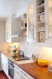 white kitchen, wood countertops. meggan