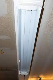 The operating cost is much higher than led lights. Removing A Surface Mounted Shop Light Home Improvement Stack Exchange