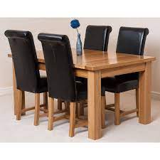 Choose from enticing options such as an expandable dining table, a square table, additional side chairs, fabric upholstered dining chairs, leather dining chairs, or bar chairs. Seattle Dining Set With 4 Black Chairs Oak Furniture King