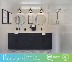 Double sink bathroom vanity cabinets are often mounted one above the other with space left for towels (and bottle traps) between. China Modern Double Sink Bathroom Vanity Floor Mounted Black Pvc Shaker Door Bathroom Cabinets China Bathroom Vanity Philippines Bathroom Cabinet Philippines Basin