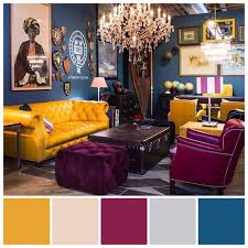 Classic Triadic Colour Scheme Of Red Yellow And Blue These Saturated Hues Dominate Thi Yellow Living Room Colors Living Room Color Schemes Yellow Living Room