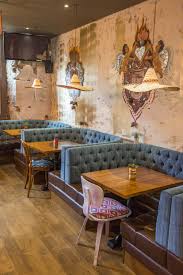 U Shaped Fixed Seating Banquette Booths In Teal Grey Colour Deep Button Tufted Backs Mexican Can Pub Interior Pub Interior Design Restaurant Interior Design