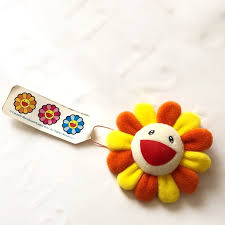 The mini plush figure comes with a pin on the back, making it perfect to attached to your backpack, jacket, or anywhere your heart desires. Takashi Murakami Jewelry Takashi Murakami Flower Pin Plush Kaikai Kiki Poshmark