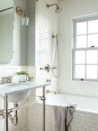 Though the space is heavy on patterns—with a bold tiled floor and a large art print—the simple black and white palette ensure it remains balanced. Ife6rlrdb2 Hdm