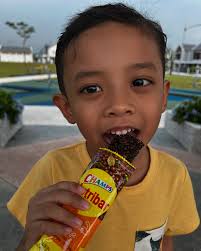 Playtime = full energy mode for Salahuddin! Good thing he's got his Champs  Nutribar Fightamin to keep him protected and charged up! Tasty, high in  Vitamin C, full of fiber, and made