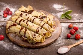 Crepes Roulees Avec Du Chocolat Fondu Recettes De Cuisine Recette Recette Crepe