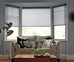 Vertical window treatment mounted outside the window opening. 20 Beautiful Living Room Designs With Bay Windows