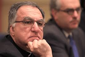 Former Baltimore priest arrested, charged with abuse of a minor