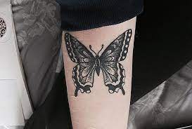 Black Butterfly Tattoo Inked On The Right Inner Forearm Black Butterfly Tattoo Butterfly Tattoo Designs Butterfly Tattoo Cover Up