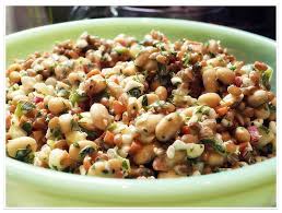 Take a fork and gently loosen up the couscous and add the cumin, ginger, olive oil and paprika powder. The Parsley Thief Perfect Protein Salad