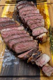 This beef strip loin, also referred to as ny strip, comes out tender, juicy and insanely. Amazing Smoked New York Strip Steaks Smoked Meat Sunday