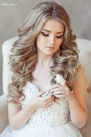 22 Bride S Favorite Wedding Hair Styles For Long Hair Long Hair Styles Wavy Wedding Hair Bride Hairstyles