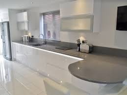 white gloss kitchen units granite