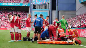 Fans chant 'christian eriksen' after player's collapse at euro 2020. Orhylr74ypsgom