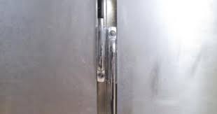 Instead of heating the dent, put on heavy gloves and apply dry ice to the dent and the surface of the refrigerator door surrounding it. How To Fix A Dent In Stainless Steel Appliances Stainless Steel Paint Stainless Steel Refrigerator Steel Fridge