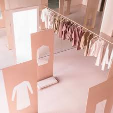 Brooklyn Studio Snarkitecture Has Used Pink Hued Steel And Floor To Ceiling Mirrors To Transform An Industrial Sp Retail Store Design Store Design Pop Up Shops