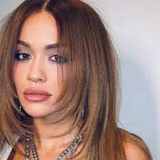 Rita Ora's Sheer Tights And Mini Dress Combo Is A Party Season Must-have