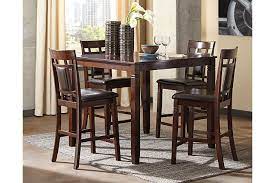 Black, white & gray dining room furniture: Bennox Counter Height Dining Table And Bar Stools Set Of 5 Ashley Furniture Homestore