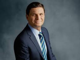 Inside a worldwide obsession (2005). David Faber Profile Cnbc