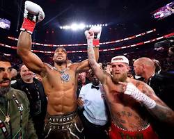 Image of Jake Paul private jet with money after Anthony Joshua fight
