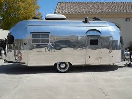 This airstream has been lovingly transformed into a vibrant and beautiful form of accommodation with a relaxing deck, contemporary interior, and space for two adults. 1951 Silver Streak Clipper For Sale