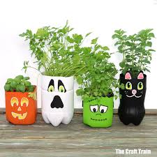 Recycled plastic bottle plant pot: Halloween Plastic Bottle Planters The Craft Train
