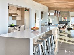 Rift white oak kitchen cabinets. Modern White Kitchen With Rift Cut Oak Cabinetry Luxe Interiors Design