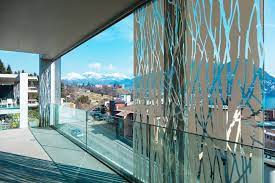 Replaces traditional rails with small clamps attached to aluminum posts. Types Of Contemporary Glass Railing In Buildings E Architect
