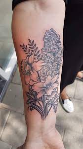 Daffodil And Larkspur Flower Tattoo Larkspur Tattoo Daffodil Tattoo Flower Tattoo Arm