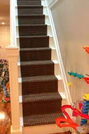 Diy Stair Runner Made From 2 5 Rubber Backed Runners From Costco Cost Approximately 30 So When It Gets Grungy In A Couple Yea Stair Runner Stairs Diy Stairs