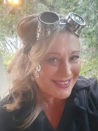 Steampunk (I designed the hat, the outerwear, pants and bag)