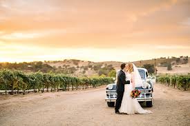 Lexa & jordan designed a ceremony that truly celebrated their ten years of life together: Paso Robles Elegant Vineyard Wedding Fall Wedding Flowers Cass Winery Wedding Flowers By Denise