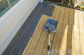 Can i stain over the newly stained. How To Stain A Wood Deck