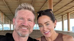 Football legend Nathan Buckley reveals girlfriend Brodie Ryan's secret  health battle: 'She's had a few seizures'