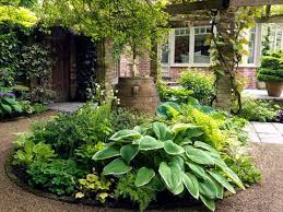 Why dump a load of stone in a garden instead of planting grass or installing a more permanent hardscape surface? 8 Front Garden Design Tips To Make Your Home Welcoming And Inviting Garden Gates And Furniture