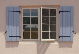 Our exterior window shutters are available in standard heights and widths as well as custom sizes to fit almost any window. Board Batten Exterior Shutters Palmetto Window Fashions Shutters Shades Blinds Drapery Gree Shutters Exterior Wooden Window Shutters House Shutters