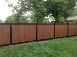 Illusions vinyl fence is an investment quality, professional grade product. Amazing Two Tone Black And Rosewood Pvc Illusions Vinyl Fence Installed By King Fence Of Westchester Ny Black Privacy Fence Designs Fence Design Vinyl Fence