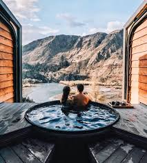 27 Outdoor Hot Springs Tubs Pools To Warm Up Your Winter Travels Hot Pools Winter Travel Vacation