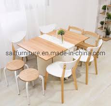 The classic wood and metal piece can be used as a shelf and easily converts to a dining table. China Folding Multifunctional Dining Table With Casters China Folding Lift Dinner Table Multi Function Dining Table